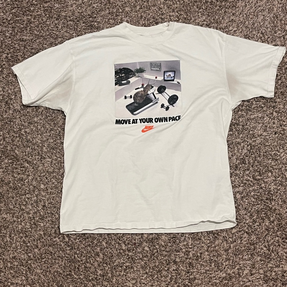 Nike Graphic Tee - “Move at your own pace”